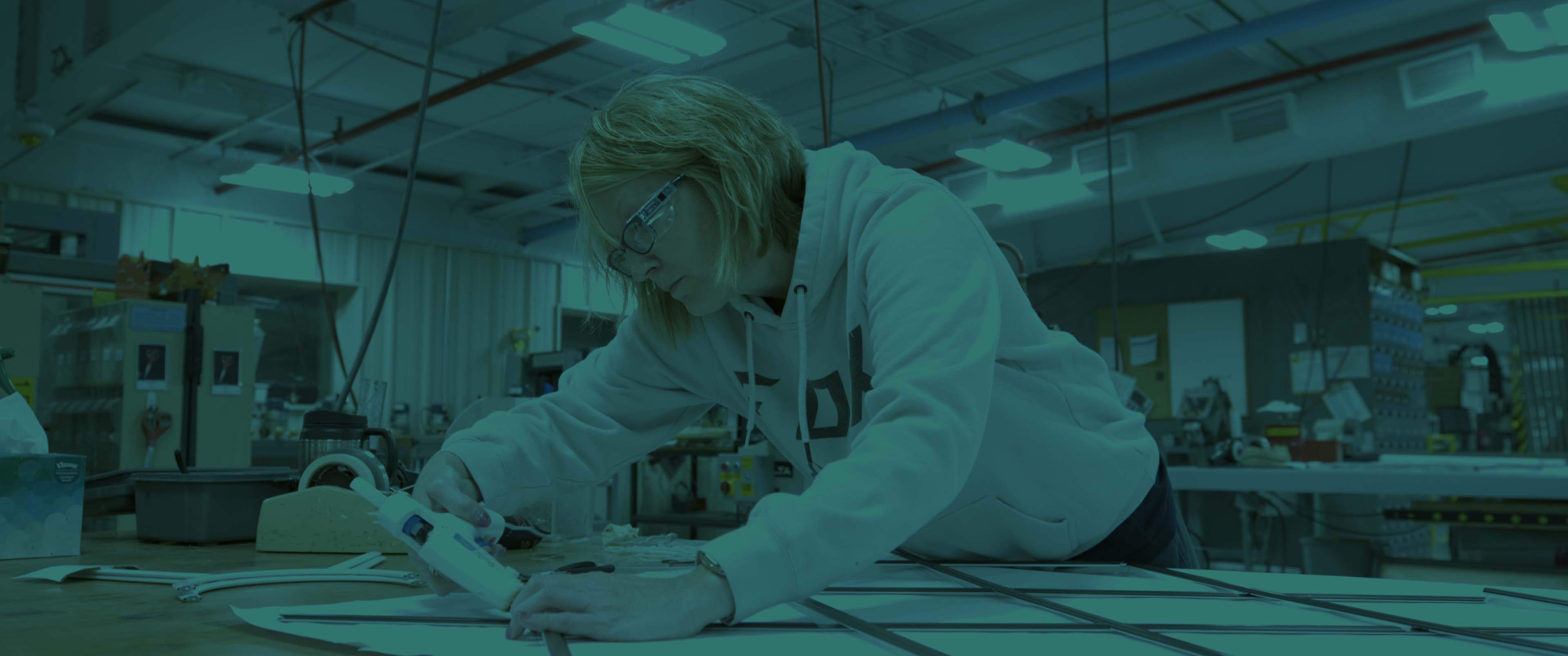 A worker in the Cardinal SGIG factory.